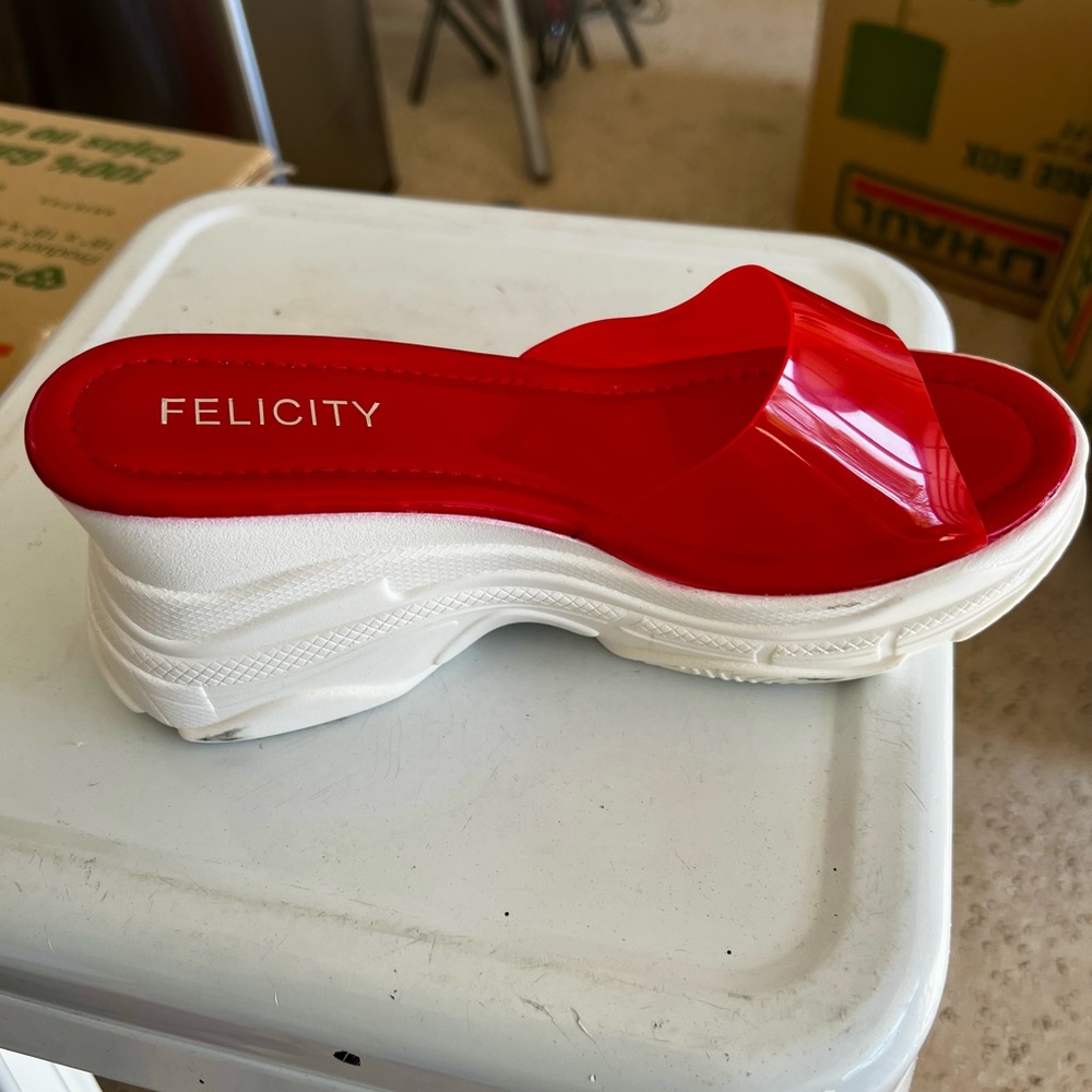 Women red slipper sandal.